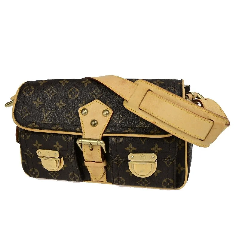 Handle bags with subtle embroidery for detail -Louis Vuitton Hudson  Canvas Shoulder Bag (Pre-Owned)