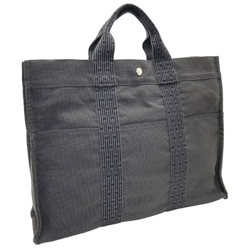 Handle bags with reinforced stitching for durability -Hermes Her Line  Nylon Canvas Tote Bag (Pre-Owned)