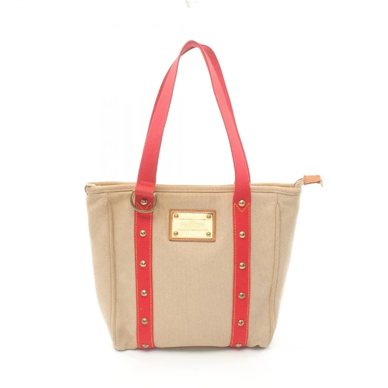 Handle bags with rustic leather for charm -Louis Vuitton   Color Canvas Leather Tote Bag (Pre-Owned)