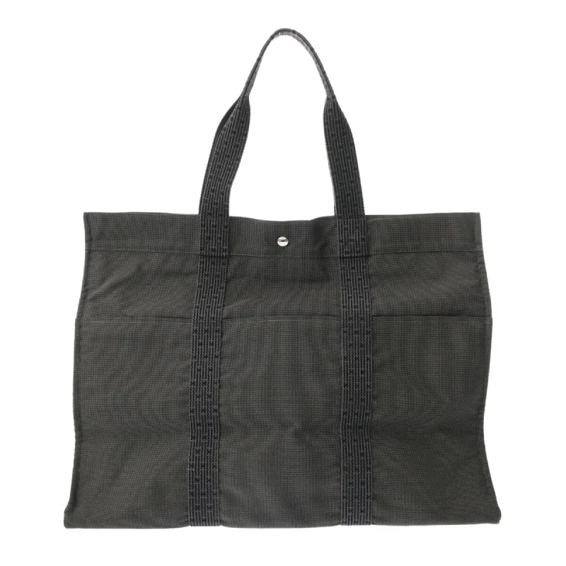 Handle bags with sleek black for elegance -Hermes  Canvas Tote Bag (Pre-Owned)