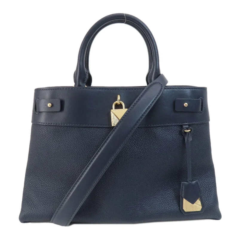 Handle bags with reinforced stitching for durability -Michael Kors  Leather Tote Bag (Pre-Owned)