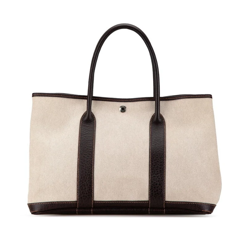 Handle bags with reinforced stitching for durability -Hermes Marron  Toile H Leather Handbag Tote Bag (Pre-Owned)