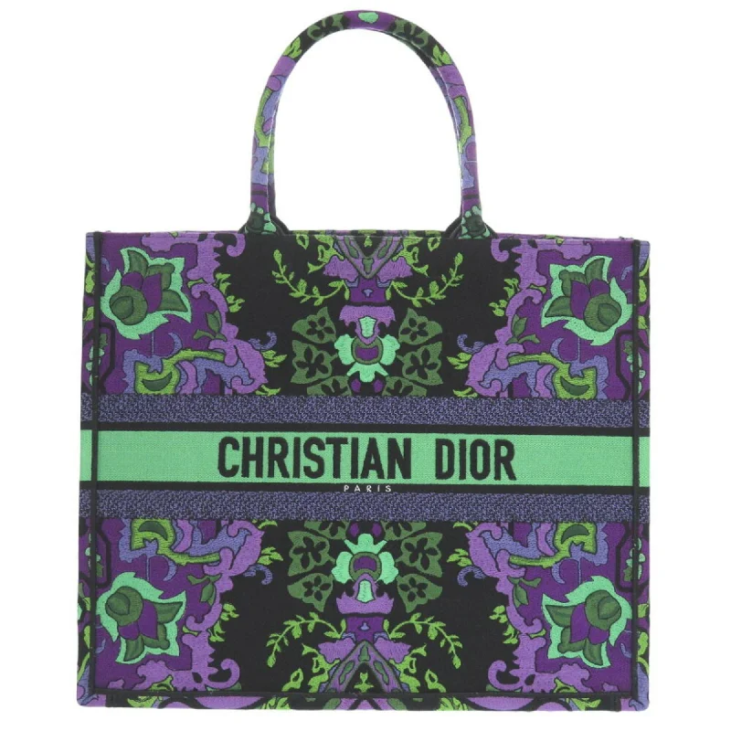 Handle bags with side pockets for organization -Christian Dior   Canvas Tote Bag (Pre-Owned)