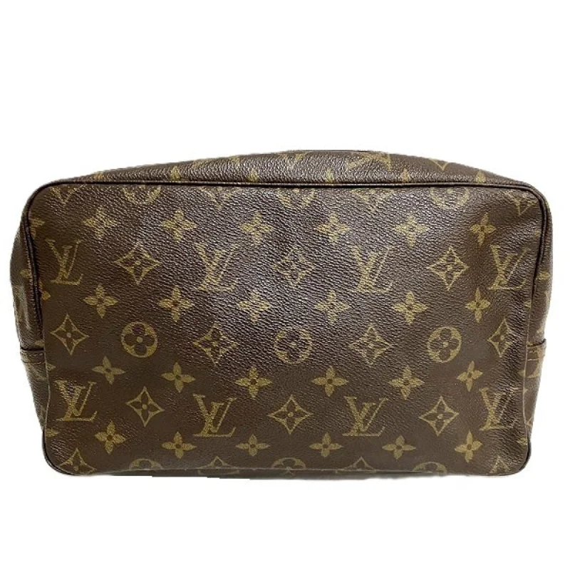 Handle bags with suede accents for texture -Louis Vuitton Monogram  Monogram Clutch Bag (Pre-Owned)